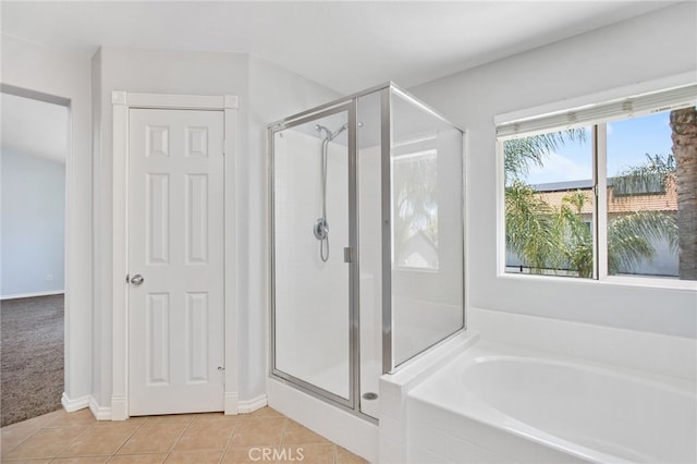 31257 Casera Ct, Menifee, CA 92584 - full bathroom featuring a shower stall, a garden tub, and tile patterned flooring