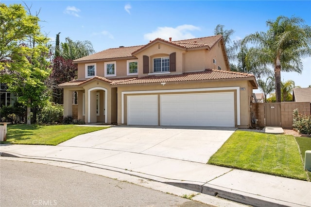 31257 Casera Ct, Menifee, CA 92584 - mediterranean / spanish home with a tile roof, stucco siding, concrete driveway, and a gate