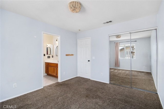31257 Casera Ct, Menifee, CA 92584 - unfurnished bedroom featuring carpet flooring, a closet, and connected bathroom