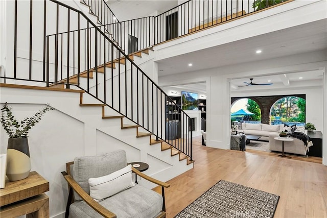 4 Thomas Rd, Ladera Ranch, CA 92694 - stairs with wood finished floors, ceiling fan, recessed lighting, and a towering ceiling