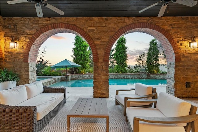 4 Thomas Rd, Ladera Ranch, CA 92694 - patio terrace at dusk featuring a ceiling fan, an outdoor living space, an outdoor pool, and a patio