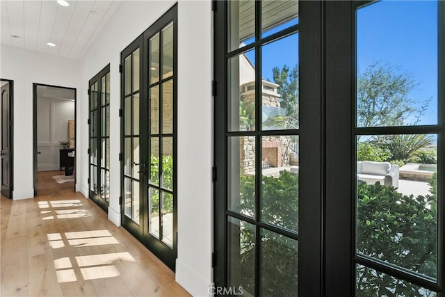 4 Thomas Rd, Ladera Ranch, CA 92694 - entryway with hardwood / wood-style flooring, recessed lighting, healthy amount of natural light, and french doors