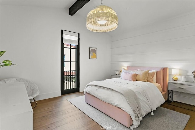 4 Thomas Rd, Ladera Ranch, CA 92694 - bedroom featuring multiple windows, beamed ceiling, and wood finished floors