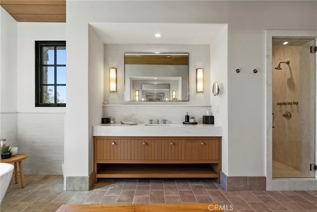 4 Thomas Rd, Ladera Ranch, CA 92694 - bathroom with a stall shower, vanity, a freestanding bath, decorative backsplash, and recessed lighting