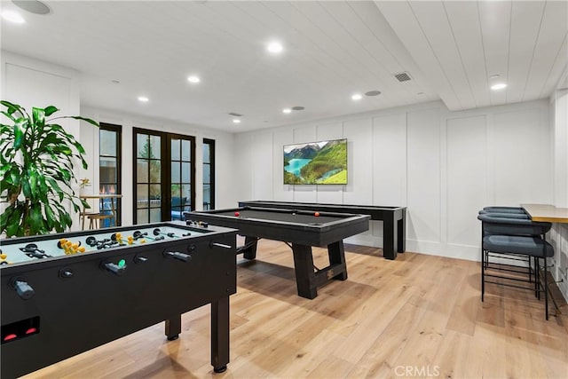 4 Thomas Rd, Ladera Ranch, CA 92694 - game room featuring a decorative wall, light wood finished floors, recessed lighting, plenty of natural light, and billiards