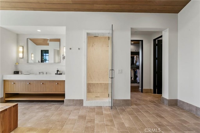 4 Thomas Rd, Ladera Ranch, CA 92694 - full bath with vanity, a stall shower, a spacious closet, and wood finished floors