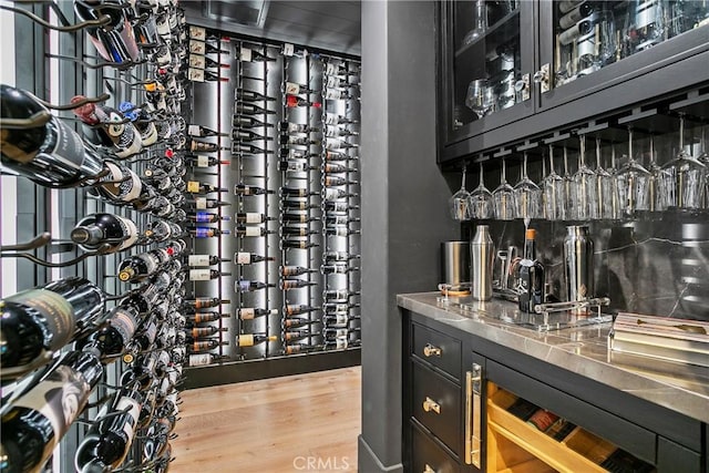 4 Thomas Rd, Ladera Ranch, CA 92694 - wine cellar featuring wood finished floors and bar