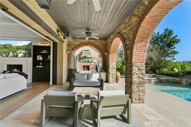 4 Thomas Rd, Ladera Ranch, CA 92694 - view of patio / terrace with a ceiling fan, an outdoor living space with a fireplace, and a pool with connected hot tub