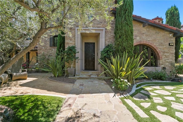4 Thomas Rd, Ladera Ranch, CA 92694 - property entrance featuring stone siding