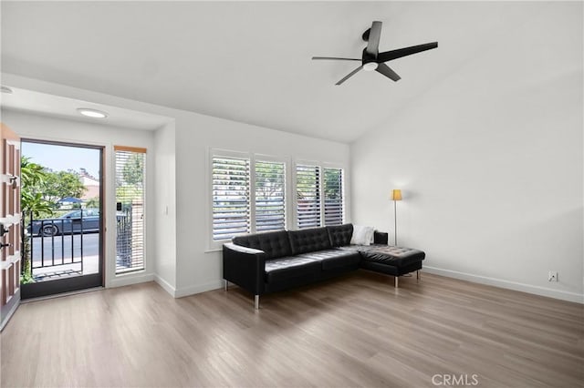 29 Morena Unit 35, Irvine, CA 92612 - living room with wood finished floors, ceiling fan, and high vaulted ceiling