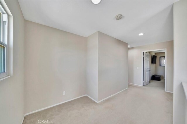 2354 Crimson Ave, Rosamond, CA 93560 - carpeted spare room featuring a smoke detector, plenty of natural light, and recessed lighting