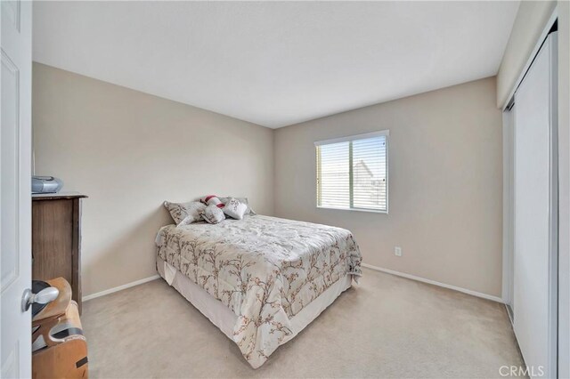 2354 Crimson Ave, Rosamond, CA 93560 - bedroom featuring light colored carpet and baseboards
