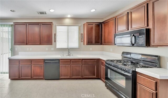 2354 Crimson Ave, Rosamond, CA 93560 - kitchen featuring black appliances, light countertops, light tile patterned floors, and recessed lighting