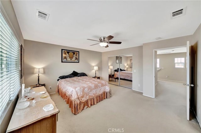 2354 Crimson Ave, Rosamond, CA 93560 - bedroom with light carpet, a closet, and ceiling fan