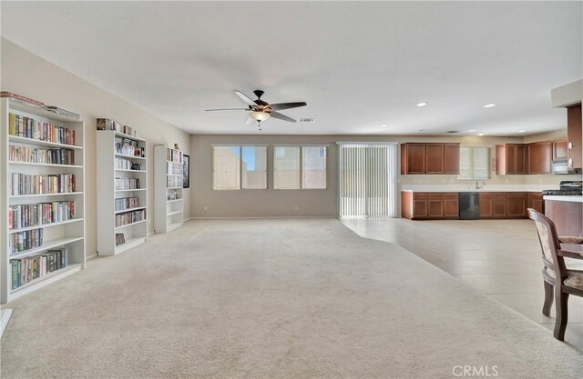 2354 Crimson Ave, Rosamond, CA 93560 - unfurnished living room with ceiling fan, built in features, light colored carpet, and recessed lighting