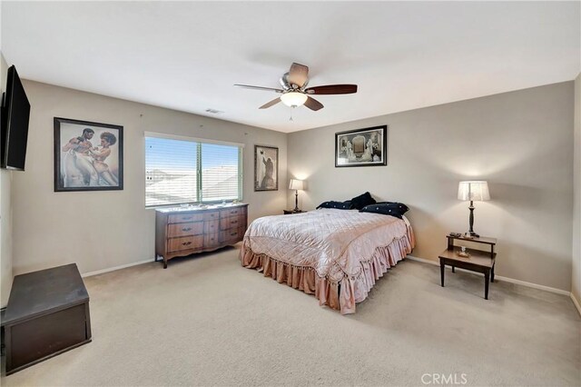 2354 Crimson Ave, Rosamond, CA 93560 - bedroom featuring light colored carpet and ceiling fan