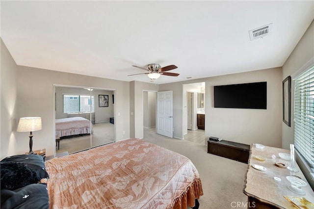 2354 Crimson Ave, Rosamond, CA 93560 - bedroom featuring light carpet, ceiling fan, and a closet