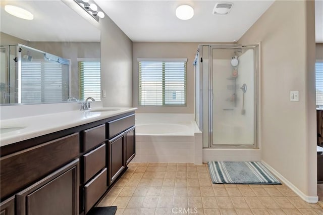 2354 Crimson Ave, Rosamond, CA 93560 - full bathroom featuring a stall shower, tile patterned floors, a garden tub, and double vanity