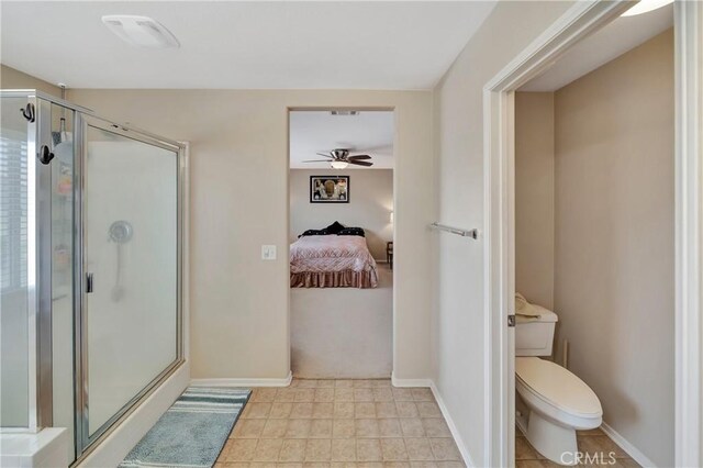 2354 Crimson Ave, Rosamond, CA 93560 - bathroom with a ceiling fan, ensuite bathroom, and a shower stall