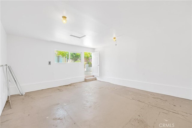 20328 Roscoe Blvd, Winnetka, CA 91306 - unfurnished room with concrete floors and baseboards