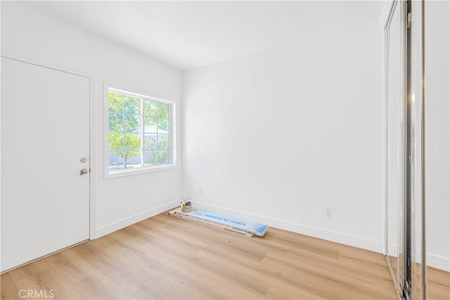 20328 Roscoe Blvd, Winnetka, CA 91306 - unfurnished bedroom with light wood finished floors and baseboards