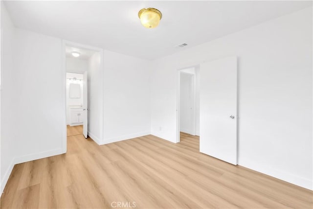 20328 Roscoe Blvd, Winnetka, CA 91306 - spare room featuring light wood-style floors and baseboards
