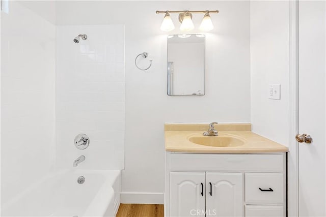 20328 Roscoe Blvd, Winnetka, CA 91306 - full bath with vanity, shower / tub combination, and wood finished floors