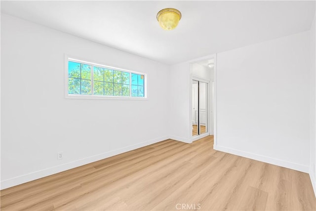 20328 Roscoe Blvd, Winnetka, CA 91306 - unfurnished room featuring light wood-type flooring and baseboards