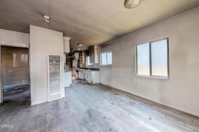 6622 5th Ave, Los Angeles, CA 90043 - unfurnished living room with a heating unit and wood finished floors
