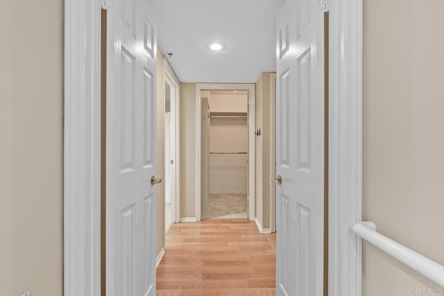 1682 Circa Del Lago Unit A306, San Marcos, CA 92078 - hall featuring light wood finished floors and recessed lighting