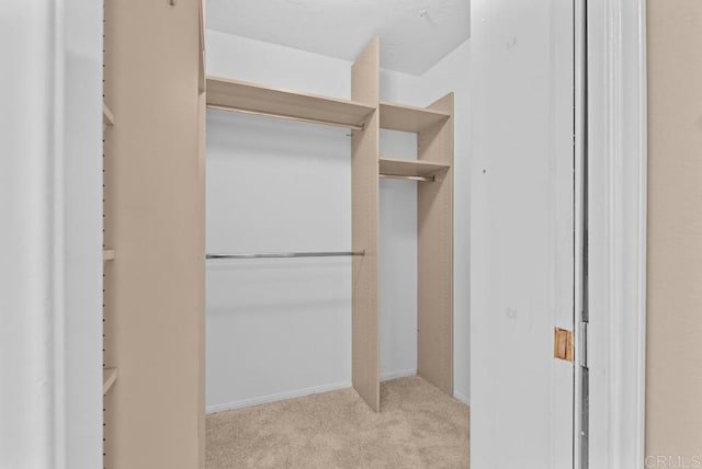 1682 Circa Del Lago Unit A306, San Marcos, CA 92078 - spacious closet featuring carpet floors