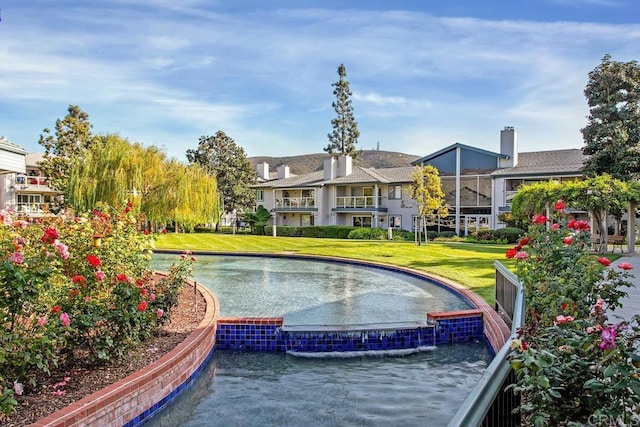 1682 Circa Del Lago Unit A306, San Marcos, CA 92078 - view of pool featuring a yard and a water view