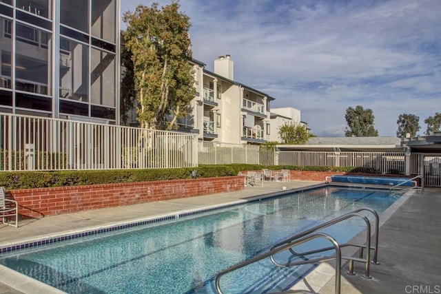 1682 Circa Del Lago Unit A306, San Marcos, CA 92078 - community pool with a patio area