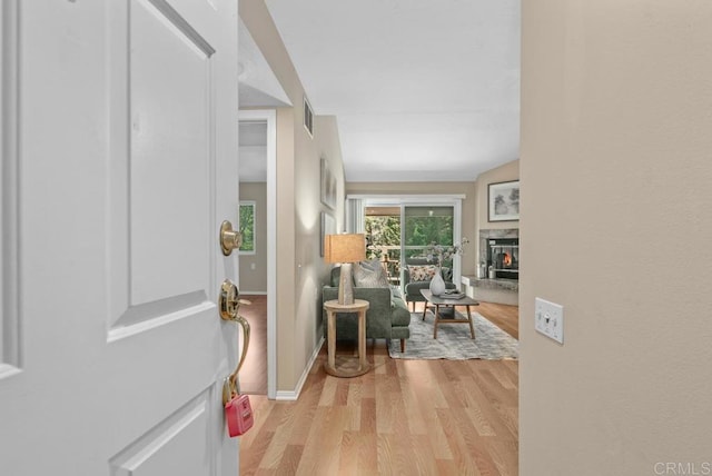 1682 Circa Del Lago Unit A306, San Marcos, CA 92078 - hall with light wood-style flooring