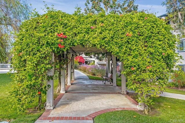 1682 Circa Del Lago Unit A306, San Marcos, CA 92078 - gate with a lawn