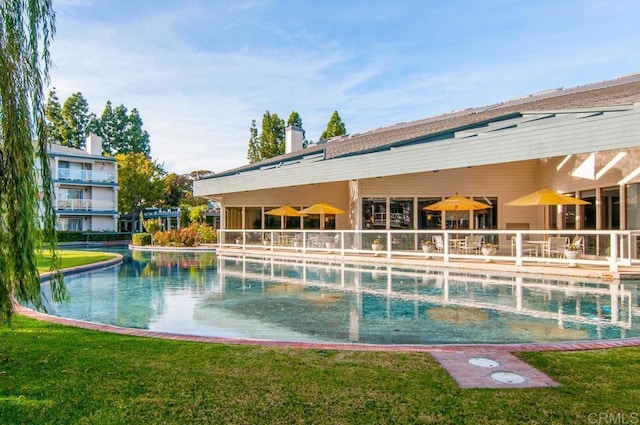 1682 Circa Del Lago Unit A306, San Marcos, CA 92078 - swimming pool featuring a lawn