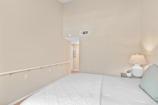 1682 Circa Del Lago Unit A306, San Marcos, CA 92078 - bedroom with baseboards and a high ceiling