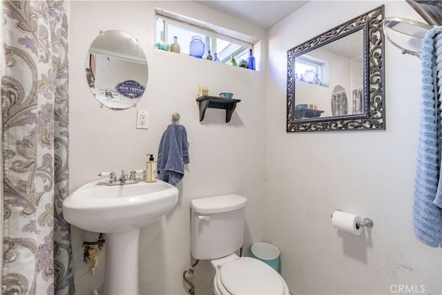 7914 Magnolia Ave, Riverside, CA 92504 - bathroom featuring toilet and a sink