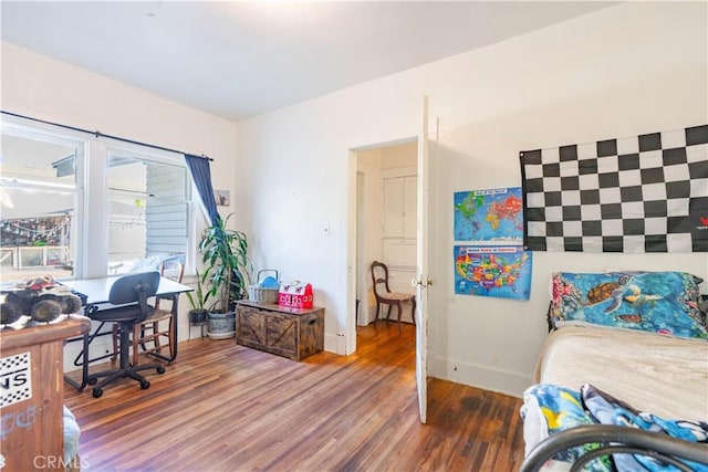 7914 Magnolia Ave, Riverside, CA 92504 - bedroom with wood finished floors and baseboards