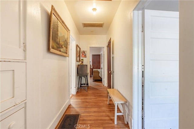 7914 Magnolia Ave, Riverside, CA 92504 - hallway with light wood-type flooring and baseboards