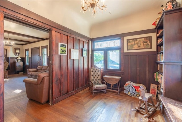 7914 Magnolia Ave, Riverside, CA 92504 - sitting room with a chandelier, a wainscoted wall, and wood walls