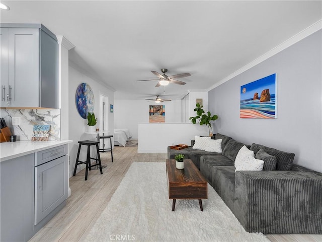 694 The Vlg, Redondo Beach, CA 90277 - living room featuring ceiling fan, light wood-type flooring, ornamental molding, and recessed lighting
