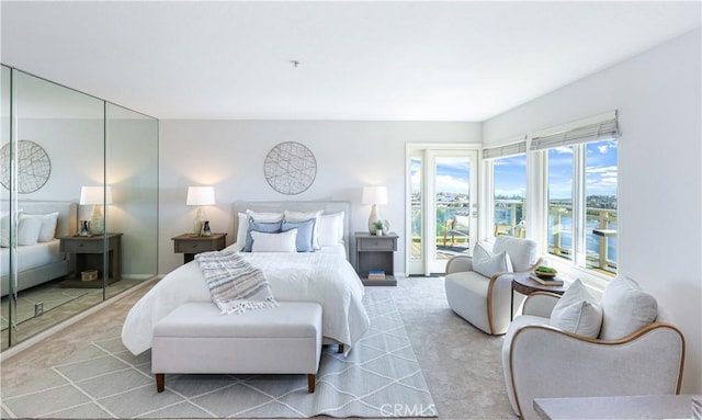 2245 Avenida Oliva, San Clemente, CA 92673 - bedroom with access to outside, carpet flooring, a water view, and a closet