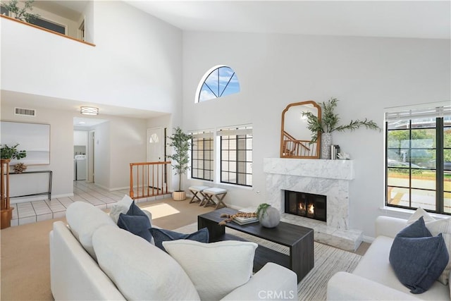 2245 Avenida Oliva, San Clemente, CA 92673 - tiled living area featuring a towering ceiling and a high end fireplace
