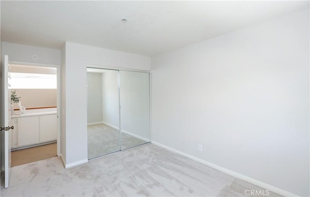 2245 Avenida Oliva, San Clemente, CA 92673 - unfurnished bedroom featuring light carpet and a closet