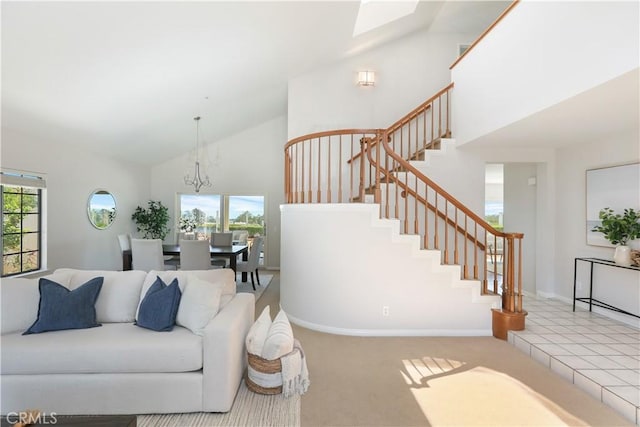 2245 Avenida Oliva, San Clemente, CA 92673 - living room featuring high vaulted ceiling, stairs, and a chandelier