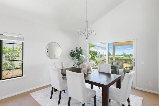 2245 Avenida Oliva, San Clemente, CA 92673 - dining area with a chandelier, high vaulted ceiling, and light colored carpet