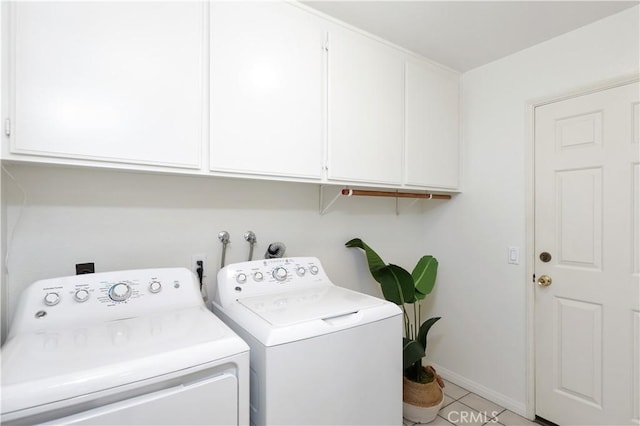 2245 Avenida Oliva, San Clemente, CA 92673 - laundry area featuring independent washer and dryer, cabinet space, and light tile patterned floors