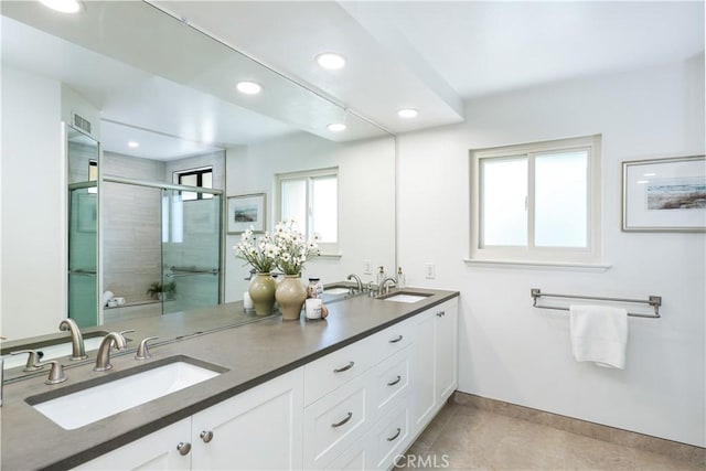 2245 Avenida Oliva, San Clemente, CA 92673 - full bath with double vanity, recessed lighting, a stall shower, and tile patterned floors