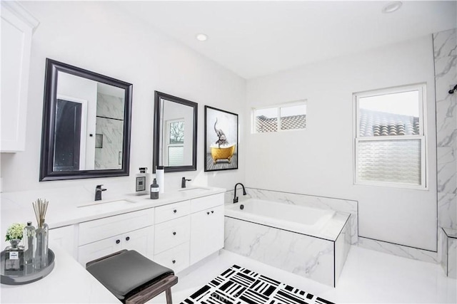 1204 Arbenz Cir, Corona, CA 92881 - bathroom featuring a bath, double vanity, and recessed lighting